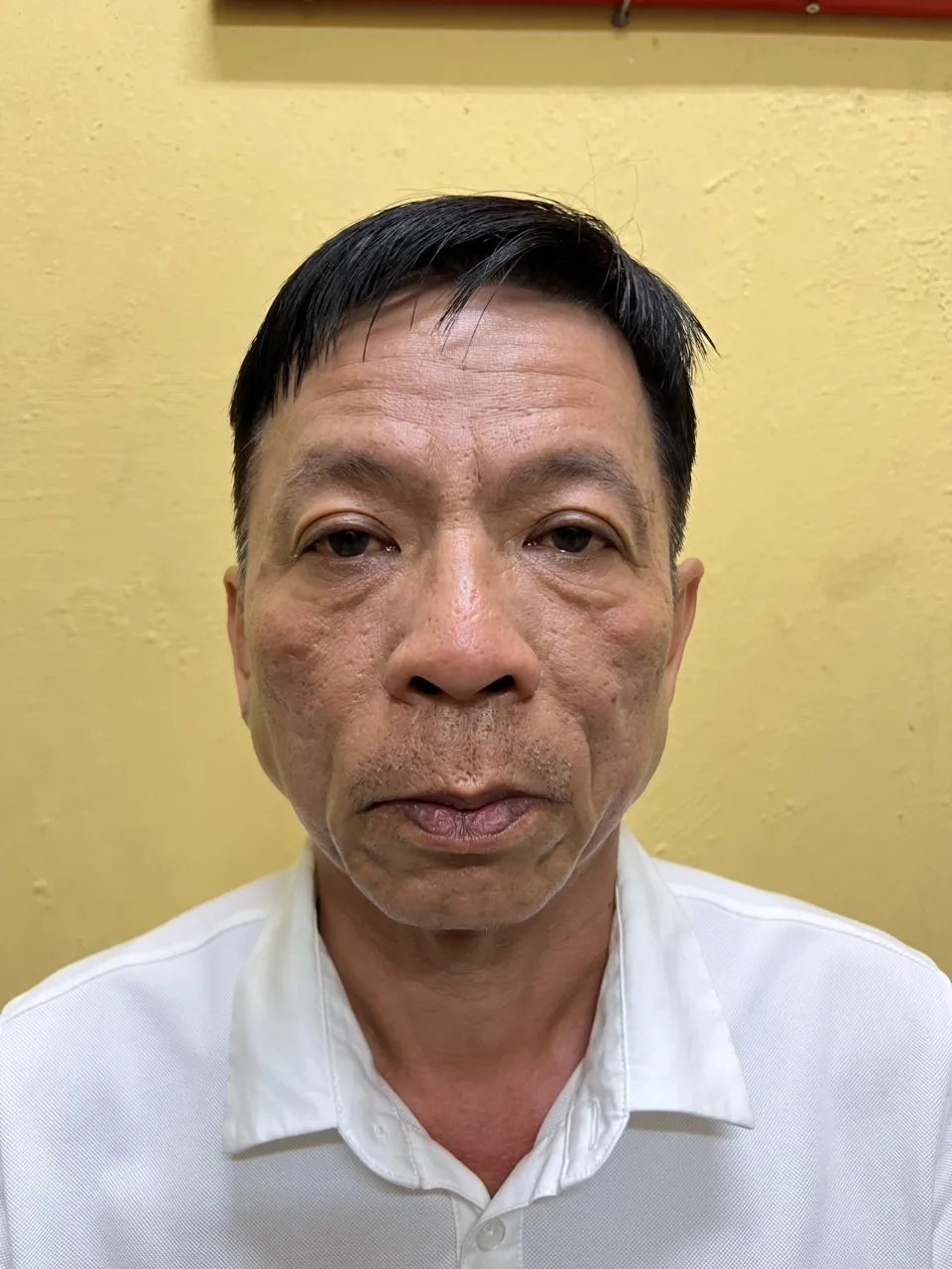 Bị can Lê Xuân Vinh