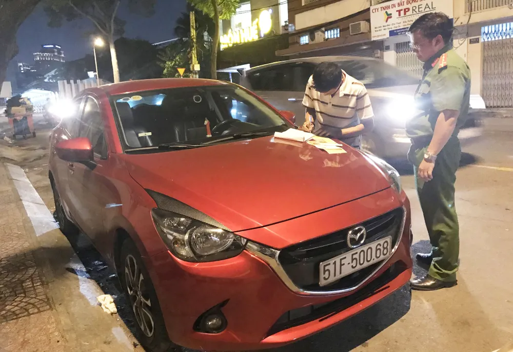 Tạt nước sôi phản ứng khi bị xử lý lấn chiếm vỉa hè ảnh 3