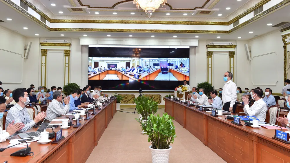 Bí thư Thành ủy TPHCM Nguyễn Thiện Nhân: Ngăn chặn sự phá sản của doanh nghiệp ảnh 1