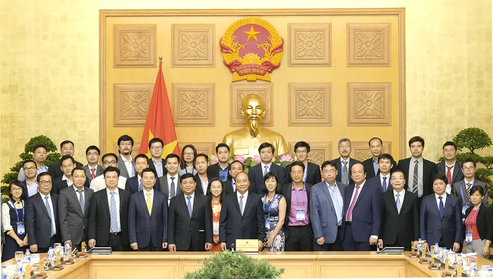 Chính phủ sẽ tạo môi trường tốt nhất cho trí thức người Việt đóng góp phát triển đất nước ảnh 1