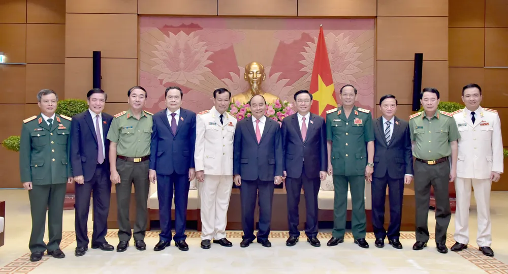 Chủ tịch nước và Chủ tịch Quốc hội dự lễ kỷ niệm 30 năm thành lập Ủy ban Quốc phòng và An ninh ảnh 1
