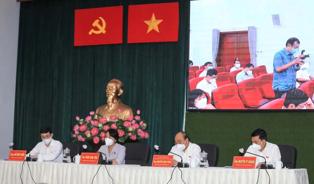 Chủ tịch nước Nguyễn Xuân Phúc: TPHCM khởi động mạnh mẽ, bài bản, căn cơ “cỗ xe tam mã” ảnh 2