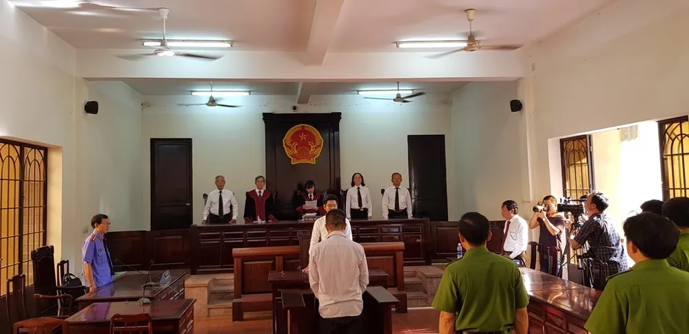 Nguyên trung uý CSGT Đồng Nai dùng súng bắn chết người yêu của con gái tình nhân lãnh 18 năm tù ảnh 1