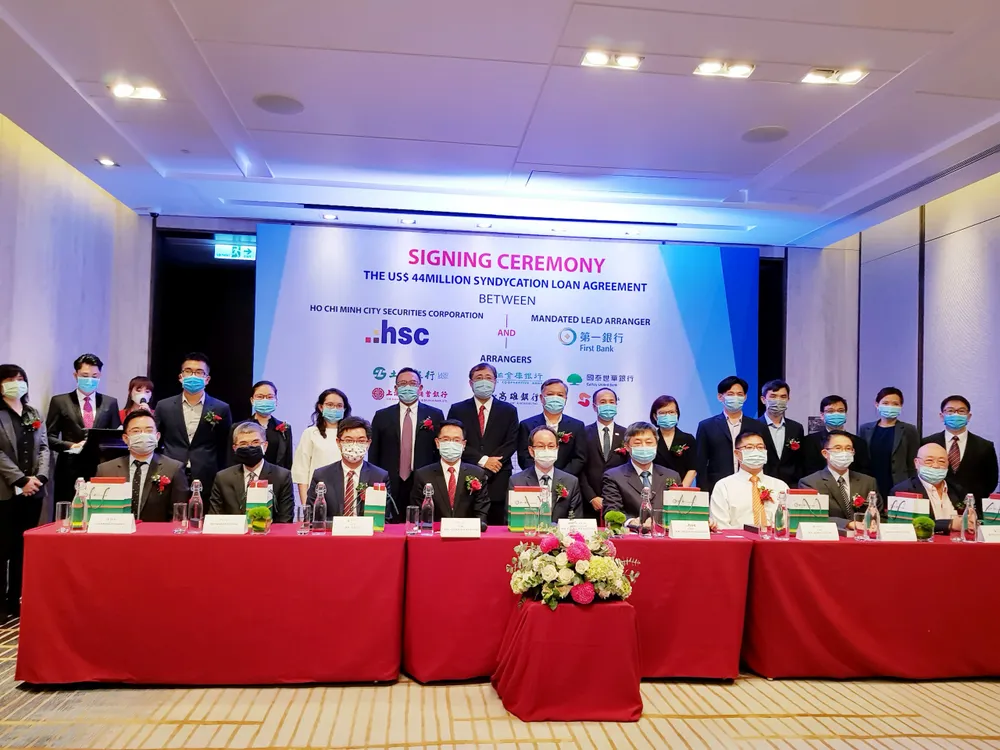 Ngân hàng First Commercial Bank cùng Công ty Cổ phần chứng khoán TPHCM ký kết hợp đồng 44 triệu USD ảnh 1