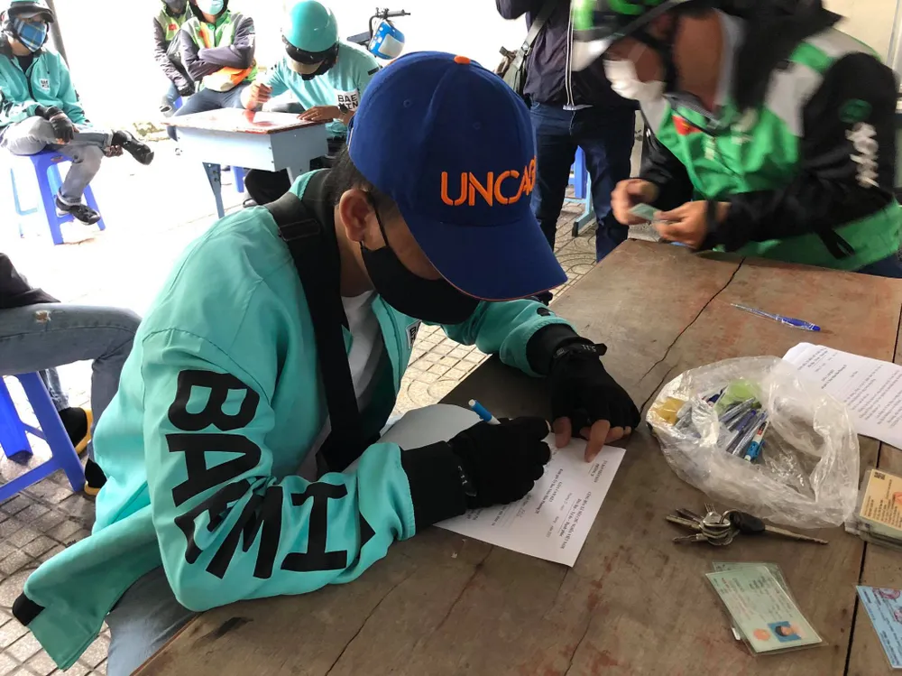 Nhiều tài xế xe công nghệ, shipper vi phạm quy định phòng chống dịch Covid-19 ảnh 4