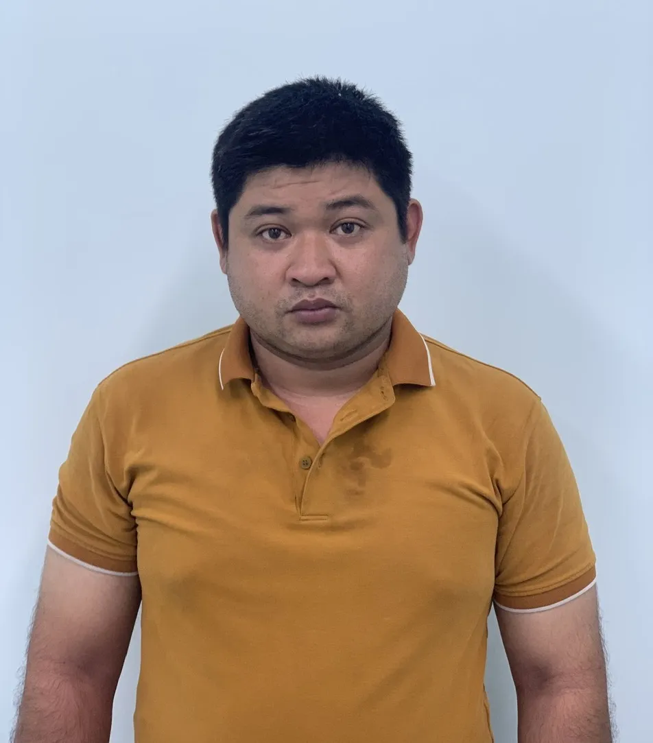 Trần Thanh Bình tại cơ quan công an