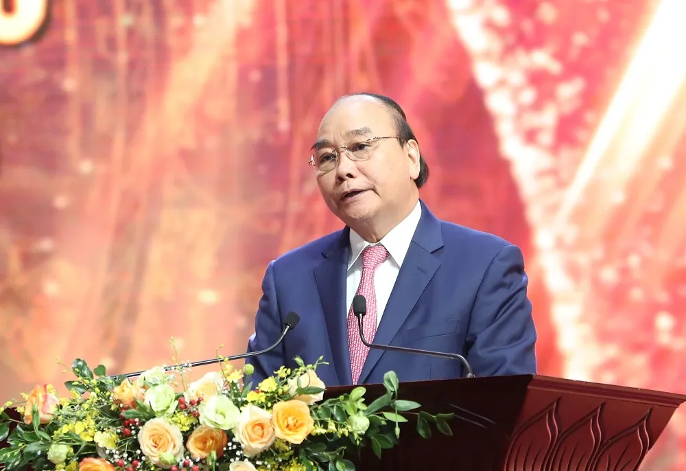 Chủ tịch nước Nguyễn Xuân Phúc: Báo chí tiên phong cung cấp kịp thời thông tin về dịch bệnh Covid-19 ảnh 1