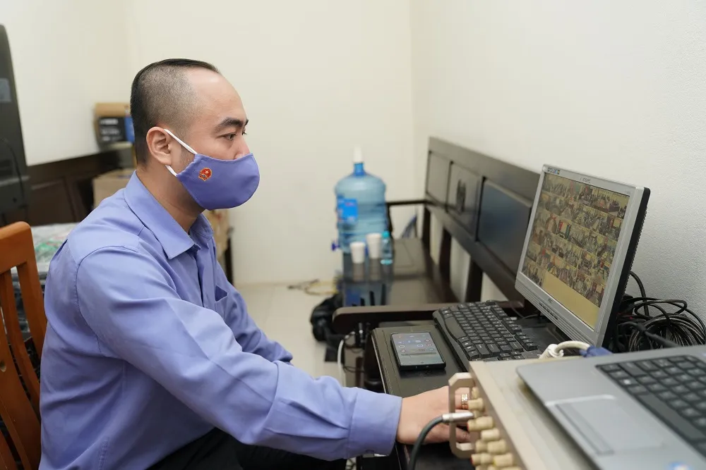 Hình ảnh phiên tòa xét xử trực tuyến được truyền trực tiếp tới 30 quận, huyện tại Hà Nội ảnh 9