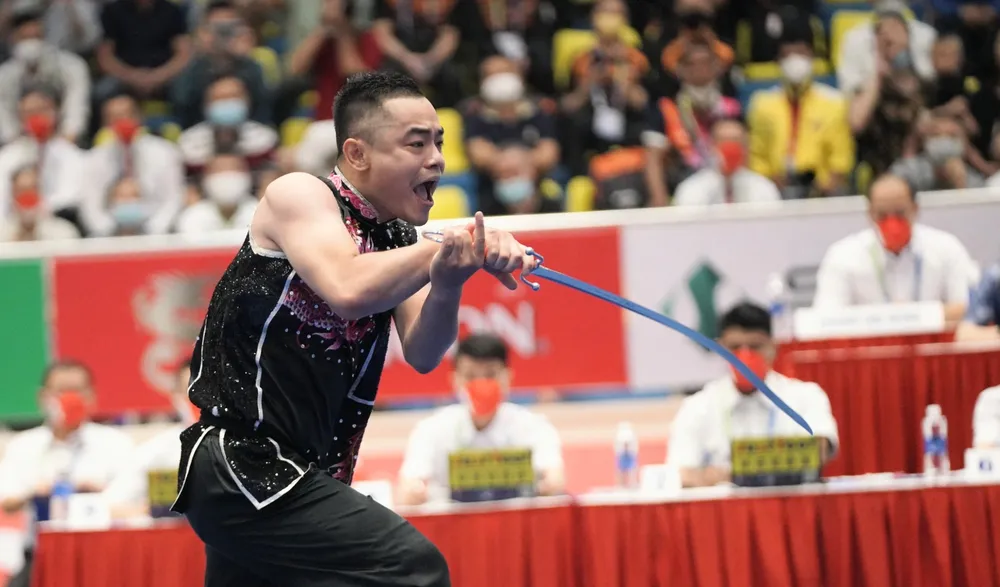 VĐV Wushu Việt Nam “bay” trên chiến thắng ảnh 15