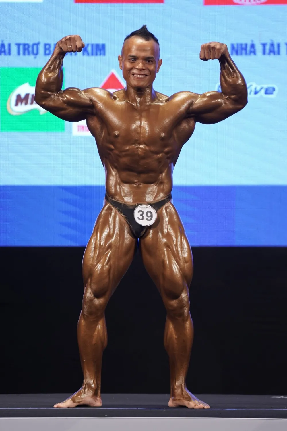 Thân hình cuồn cuộn của lực sĩ Trần Hoàng Duy Thuận vừa giành huy chương vàng ảnh 6