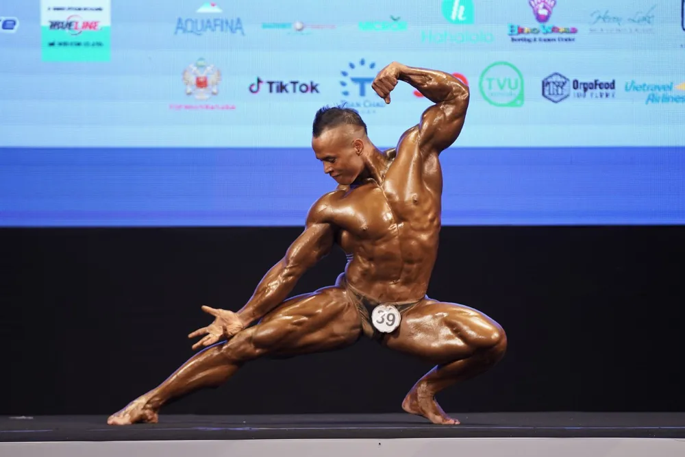 Thân hình cuồn cuộn của lực sĩ Trần Hoàng Duy Thuận vừa giành huy chương vàng ảnh 4