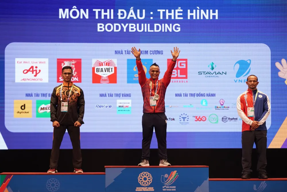 Thân hình cuồn cuộn của lực sĩ Trần Hoàng Duy Thuận vừa giành huy chương vàng ảnh 14