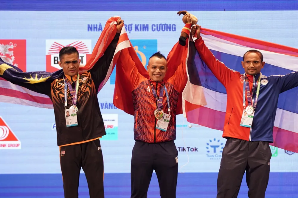 Thân hình cuồn cuộn của lực sĩ Trần Hoàng Duy Thuận vừa giành huy chương vàng ảnh 15