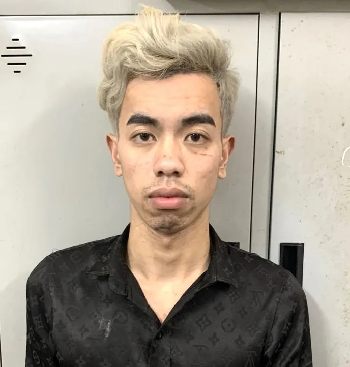 Hoàng Văn Thành tại cơ quan công an