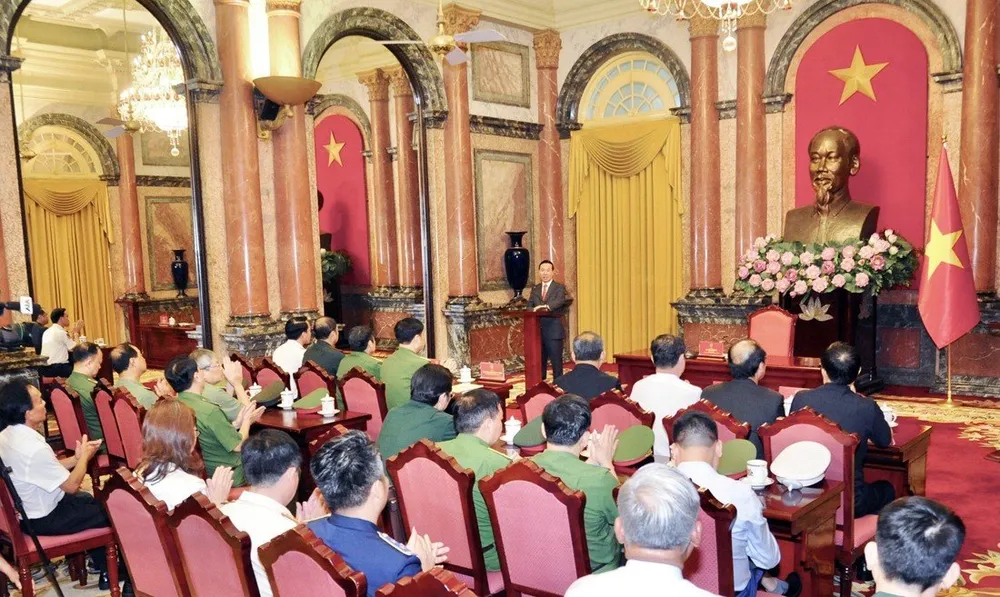 Quang cảnh buổi gặp giữa các điển hình tiên tiến trong công tác phòng chống ma túy với Chủ tịch nước sáng 14-6. Ảnh: XUÂN TRƯỜNG