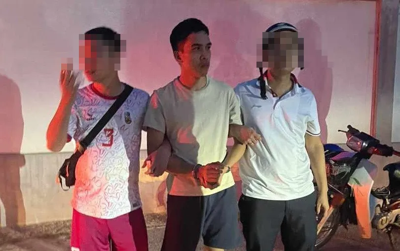 Bị can Nguyễn Đức Trung khi bị bắt