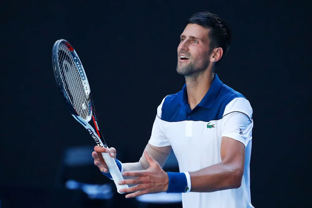 Australian Open 2018: Cựu vô địch Wawrinka rơi đài, ĐKVĐ Wimbledon là Muguruza cũng bị loại ảnh 1