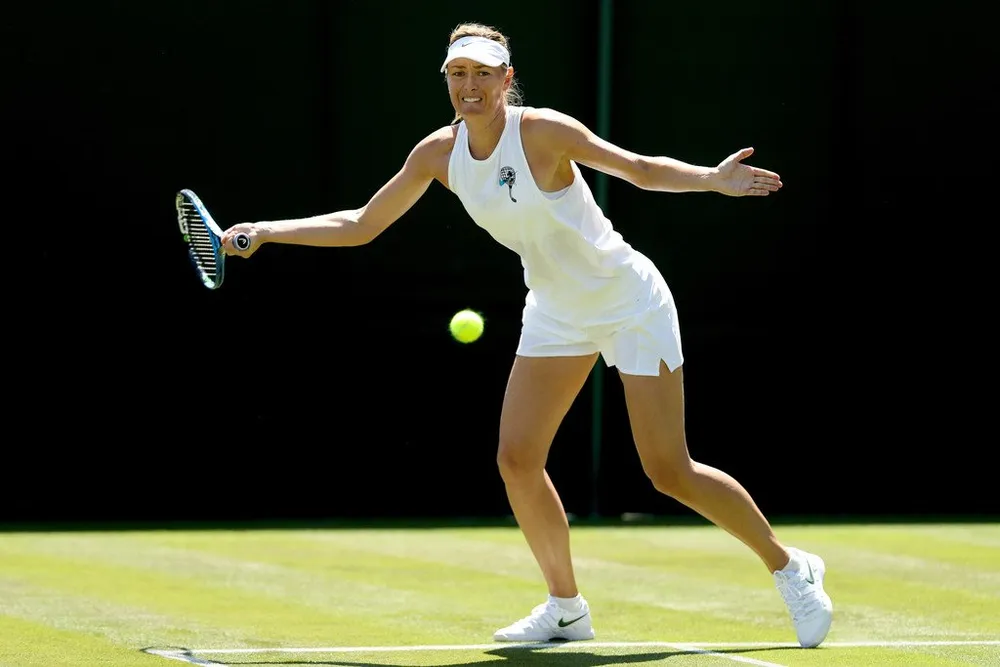 Khoảnh khắc cuối tuần: Federer chơi đùa với 2 con trai sinh đôi, Wozniacki lên ngôi ở Eastbourne ảnh 5