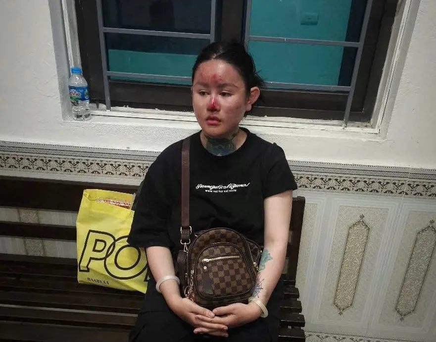 Nguyễn Thị Hoàng Ngân tại cơ quan công an. Ảnh công an cung cấp