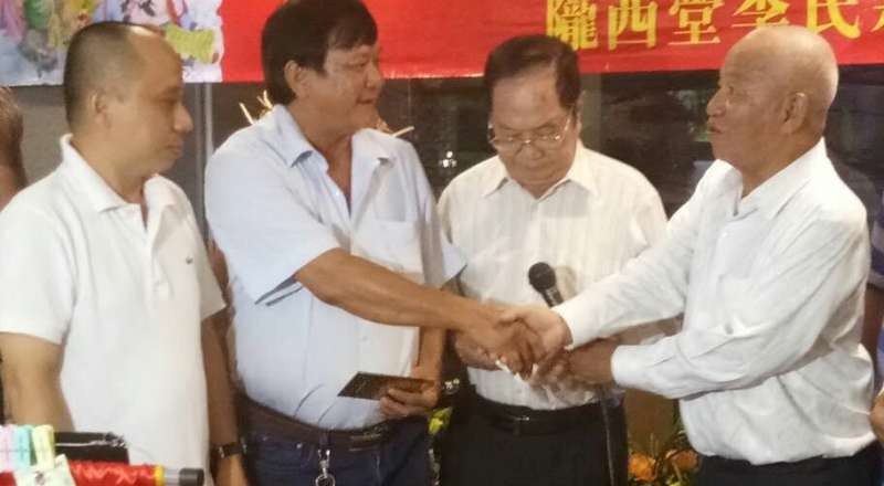 圖為李庭輝父子。（資料圖源： 磊 磊）