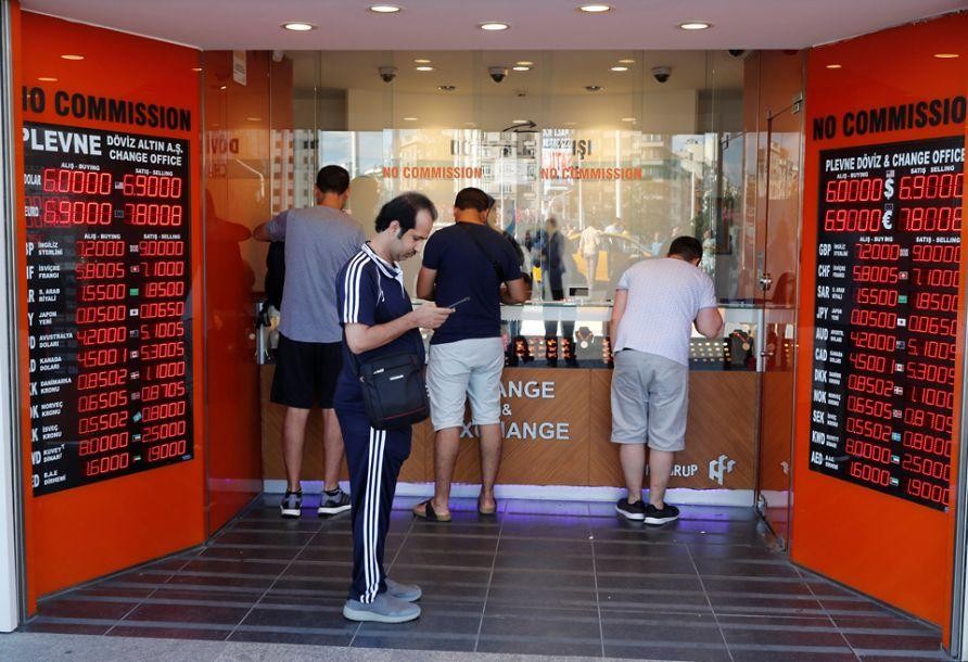 土里拉對美元匯率13日跌破7里拉對1美元。