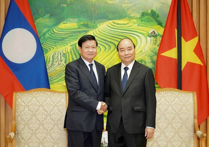 政府總理阮春福接見由老撾人民革命黨中央政治局委員、政府總理通倫‧西蘇里率領前來我國出席原黨中央總書記黎可漂國葬的老撾黨、國家與建國陣線高級代表團。