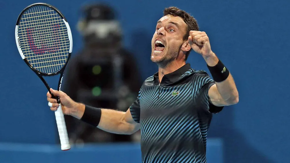 Qatar Open và cú sốc lớn đầu năm - Djokovic thua Bautista ở bán kết ảnh 1