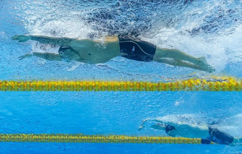 Giải bơi lội VĐTG: Dressel phá KLTG 10 năm tuổi của Phelps,VĐV 17 tuổi cũng phá KLTG 200m ngửa nữ ảnh 1