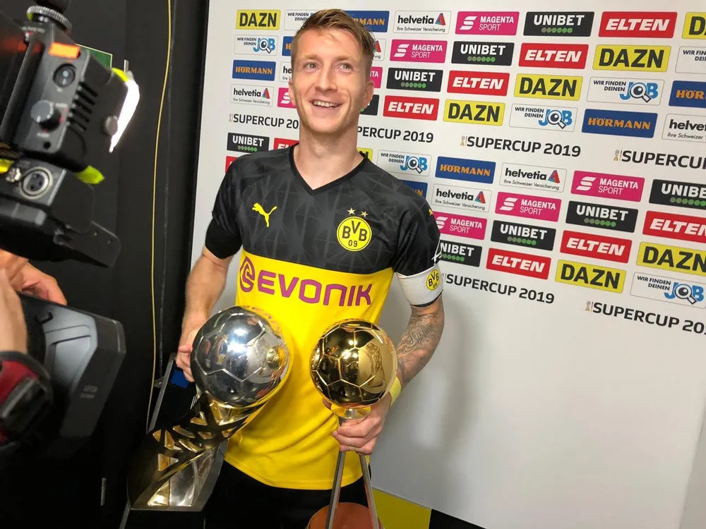 Borussia Dortmund ăn mừng Siêu cúp nước Đức sau khi đánh bại Bayern ảnh 5