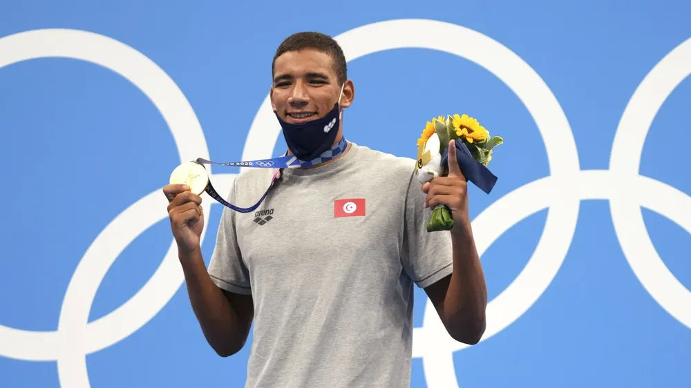 Đường đua xanh dậy sóng với hàng loạt cú sốc: Ariarne Titmus hạ bệ Katie Ledecky, Ahmed Hafnaoui bất ngờ thắng HCV ảnh 3