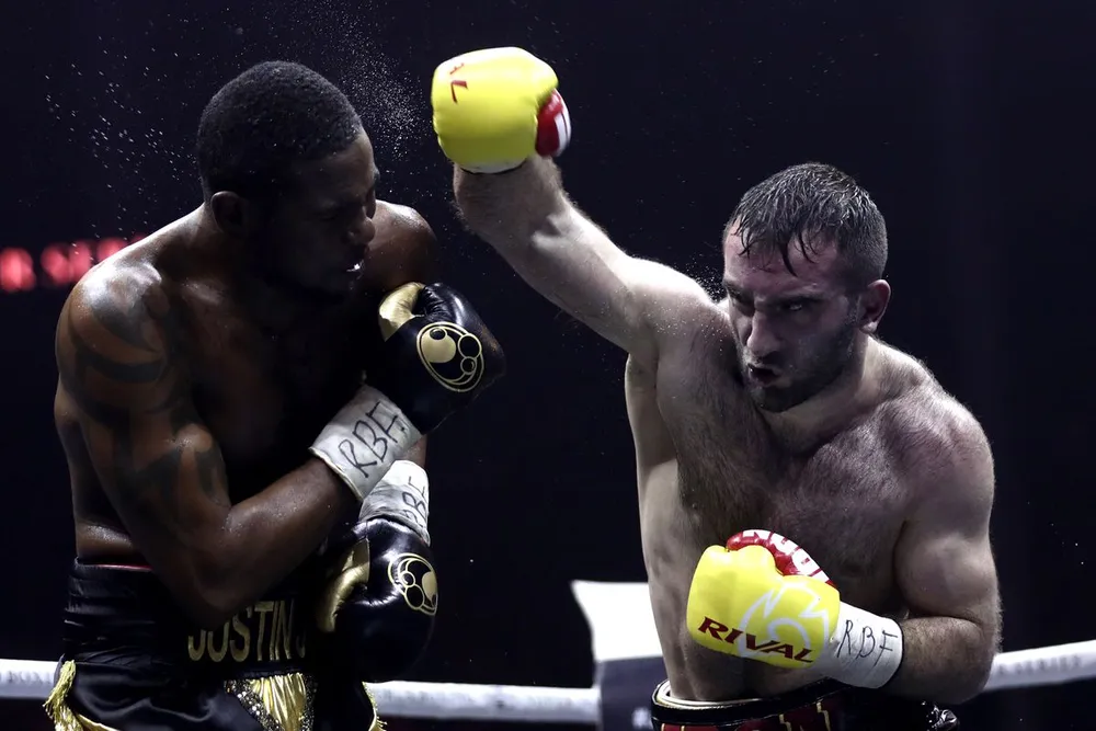 Gassiev trong trận đấu với Dorticos Gassiev trong trận đấu với Dorticos