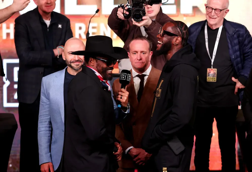 Chisora và Wilder cười cười nhưng toàn dùng từ ngữ tục tĩu nhắm vào nhau