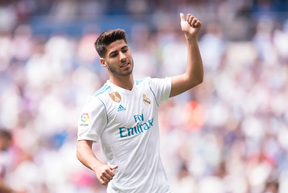Marco Asensio chơi rất hay mùa này trong màu áo Real Madrid. Ảnh: Getty Images. 