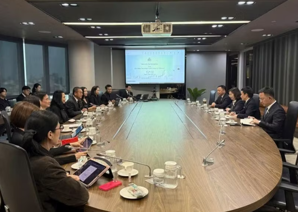 会见现场。图自越南国家证券委员会