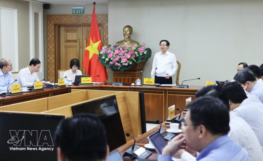 政府副总理胡国勇主持会议。图自越通社