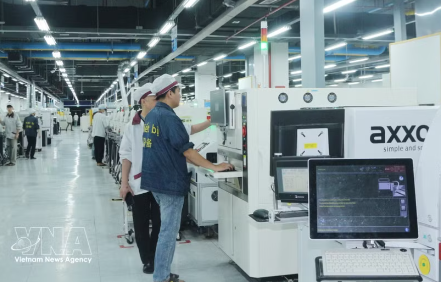 越南Wistron Infocomm有限责任公司生产车间。图自越通社