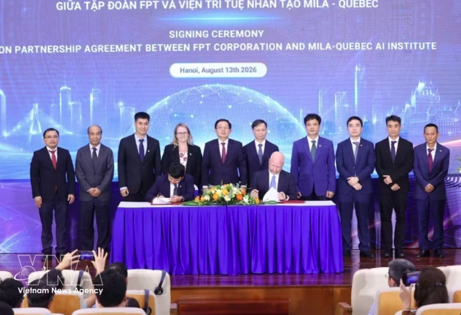 签署仪式现场。图自越通社