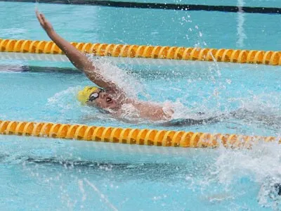 Trần Duy Khôi đóng góp nhiều thành tích HCV cho đội bơi TPHCM tại giải lần này. Ảnh: NHẬT ANH