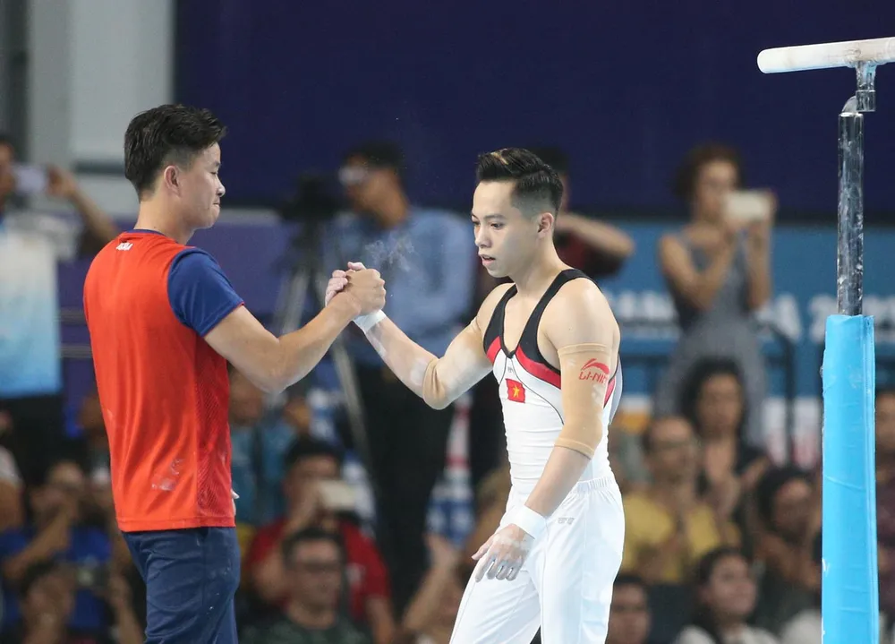 Ban huấn luyện đội tuyển TDDC Việt Nam luôn có sự động viên tinh thần các tuyển thủ để thi đấu đạt thành tích cao nhất. Ảnh: D.P