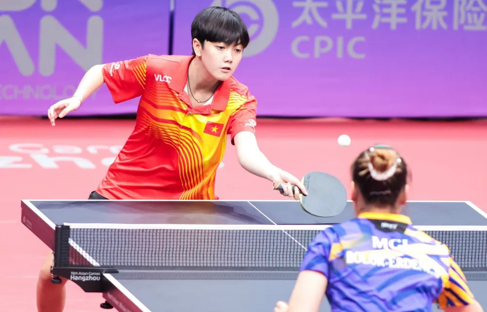 Trần Mai Ngọc và đồng đội giành chiến thắng để lọt vào vòng tiếp theo nội dung đồng đội nữ. Ảnh: ĐOÀNTTVN