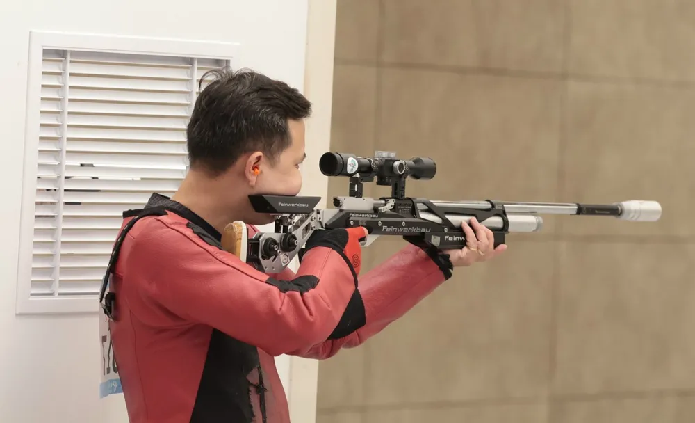 Xạ thủ Ngô Hữu Vương thi đấu trong ngày 26-9 nhưng không giành được kết quả huy chương. Ảnh: LƯỢNG LƯỢNG