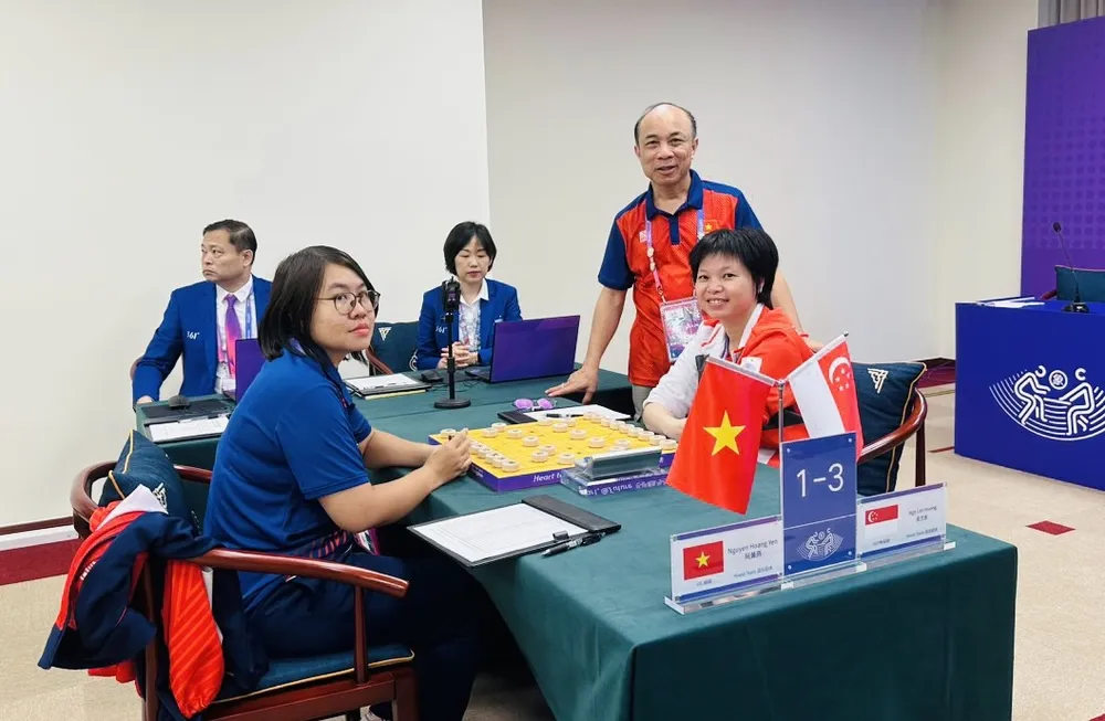 Nguyễn Hoàng Yến gặp Ngô Lan Hương tại trận đầu tiên ở ASIAD 19. Ảnh: MINH THẮNG