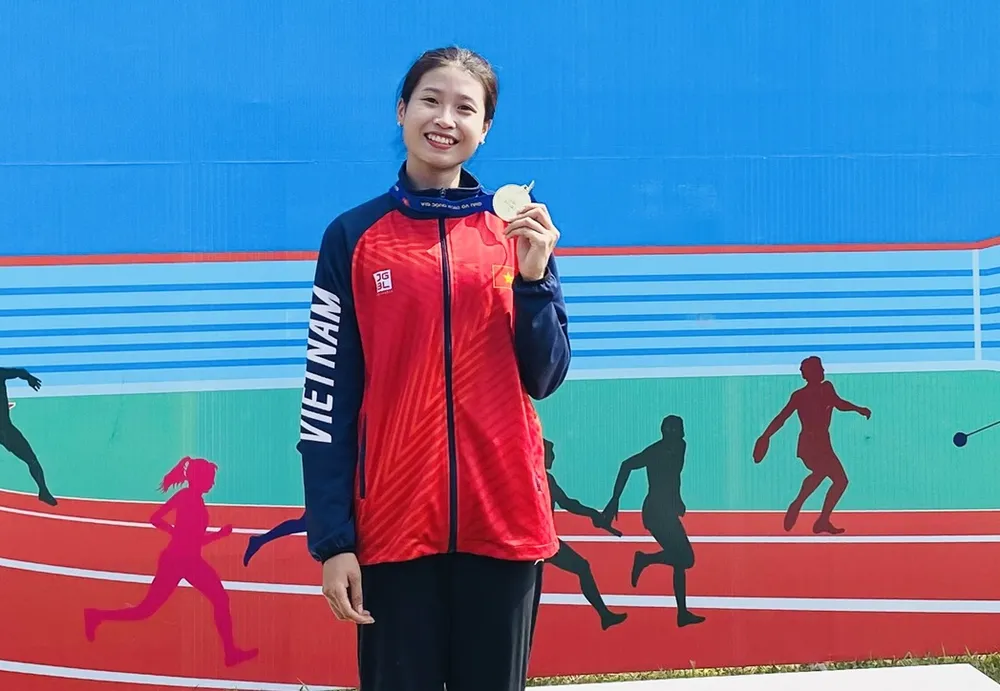 Nguyễn Thị Hường có kết quả tốt nhất nội dung nhảy ba bước nữ giải năm nay. Ảnh: MINH MINH