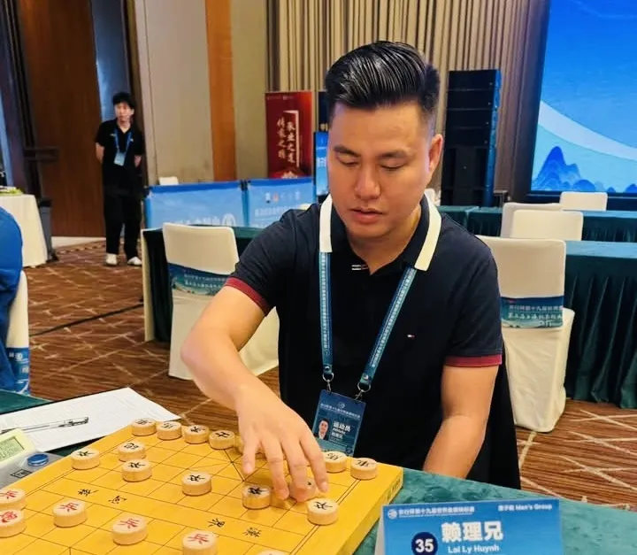 Lại Lý Huynh giành quyền vào chung kết cá nhân cờ tiêu chuẩn. Ảnh: VXF