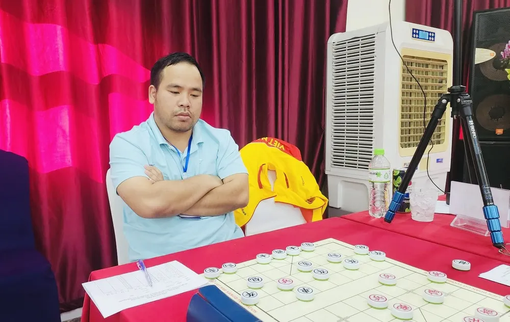 Kỳ thủ Nguyễn Minh Nhật Quang của TPHCM đã giành HCV trong nội dung cờ siêu chớp và cờ chớp. Ảnh: VXF