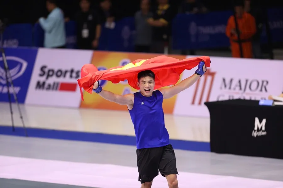 Quàng Văn Minh giành chiến thắng và có HCV tại SEA Games 33-2025. Ảnh: DŨNG PHƯƠNG