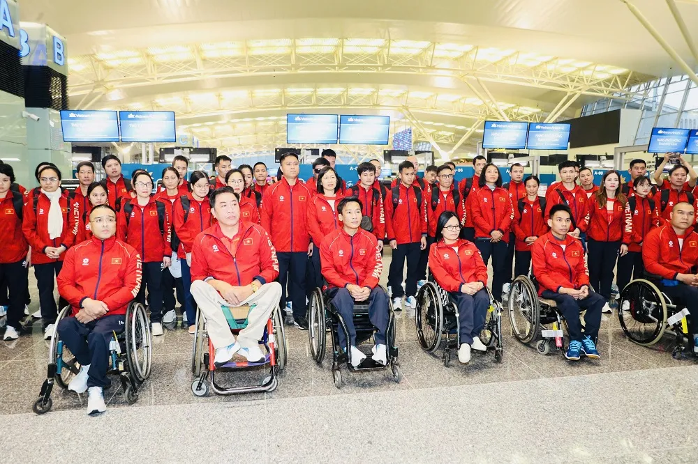 Thành viên Đoàn thể thao người khuyết tật Việt Nam tự tin tham dự ASEAN Para Games 13. Ảnh: LƯỢNG LƯỢNG