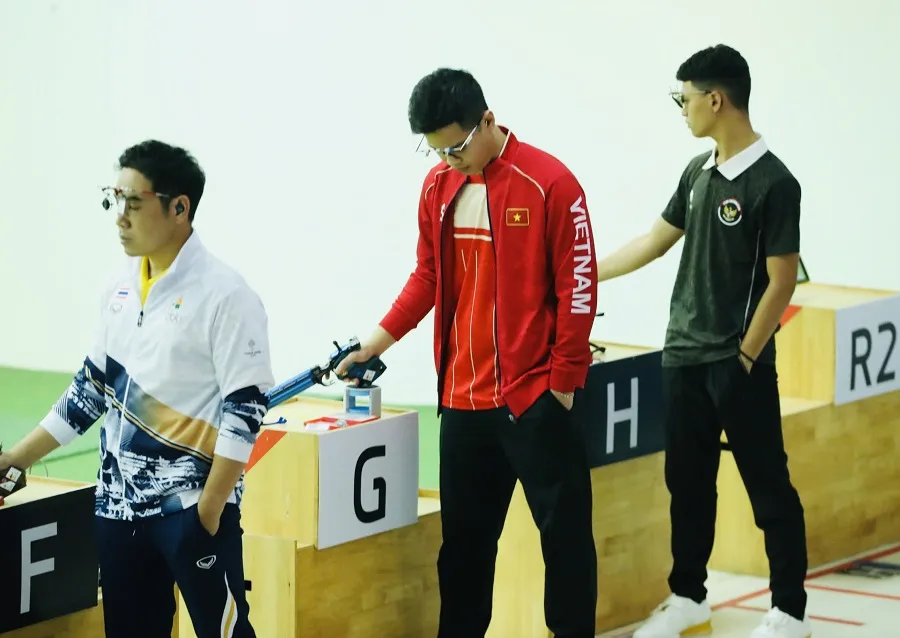 Xạ thủ Phạm Quang Huy của đội tuyển bắn súng Việt Nam. Ảnh: DP