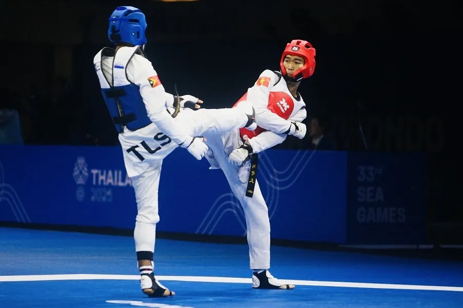 Nguyễn Hồng Trọng (đỏ) là 1 trong những võ sĩ của taekwondo Việt Nam được cử tới Mỹ thi đấu. Ảnh: DŨNG PHƯƠNG