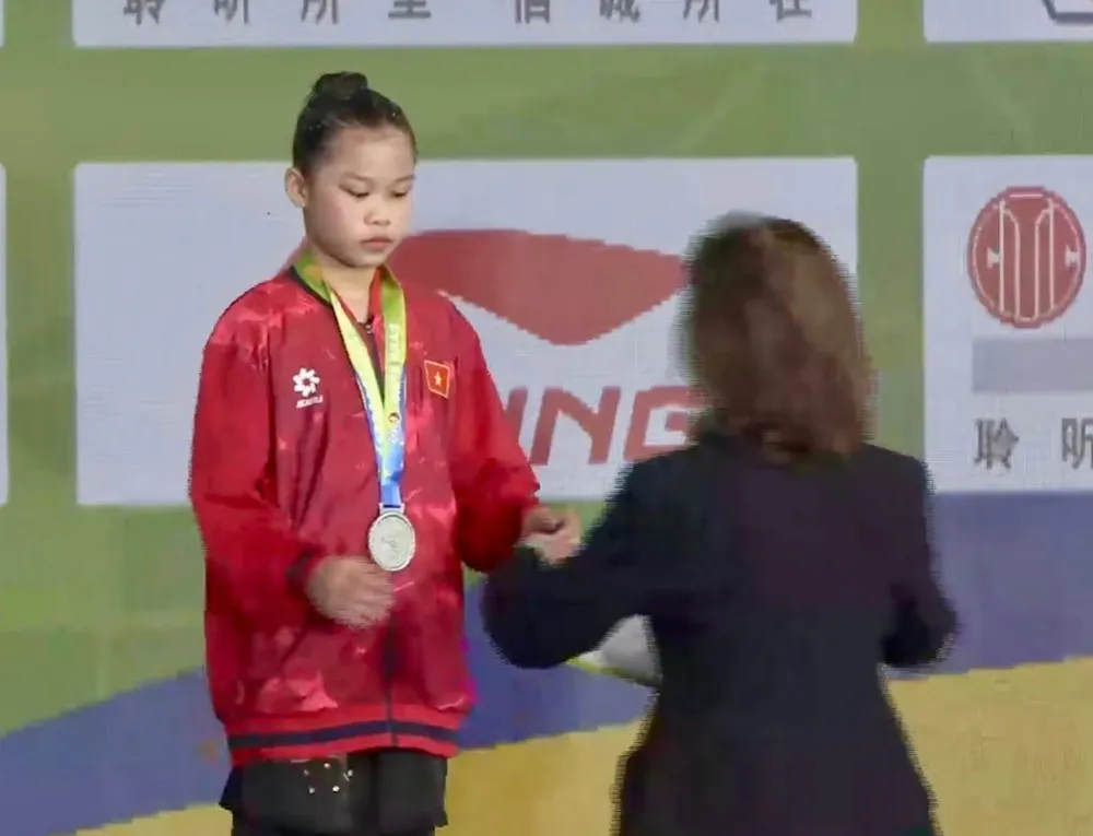 VĐV wushu Việt Nam có kết quả huy chương tại giải đấu. Ảnh: BTC